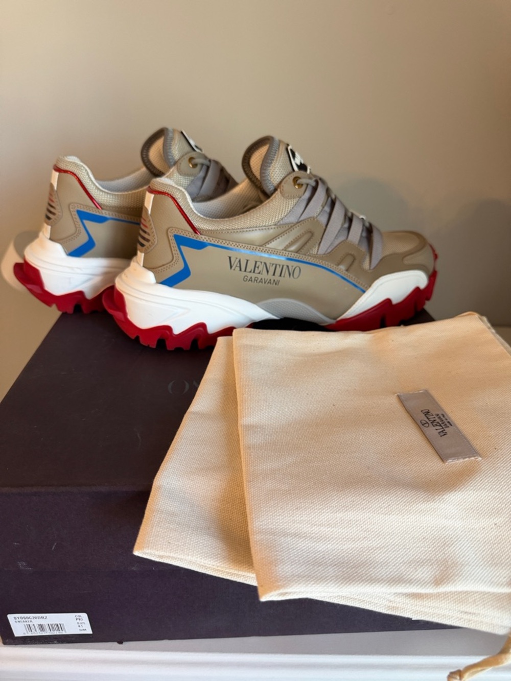 Valentino Garavani Beige Sneakers with Red Outsole and Blue Accents